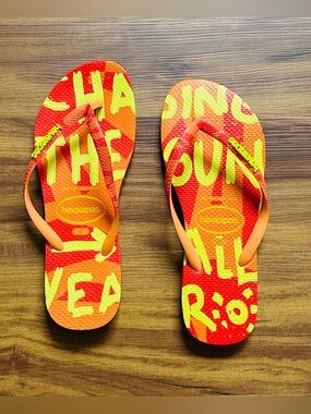 Havaianas Orange Flip Flops with Yellow Graphic Print